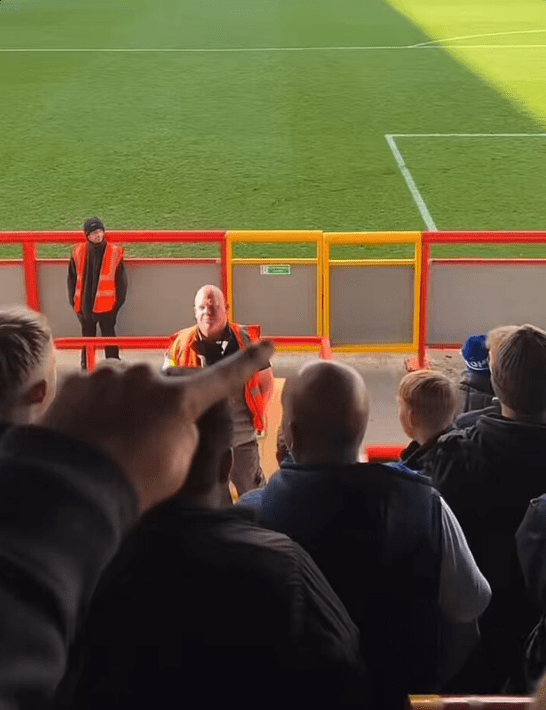 A steward at Morecambe's League Two clash with Chesterfield last month was serenaded by fans who claimed he looked like darts star Michael van Gerwen.