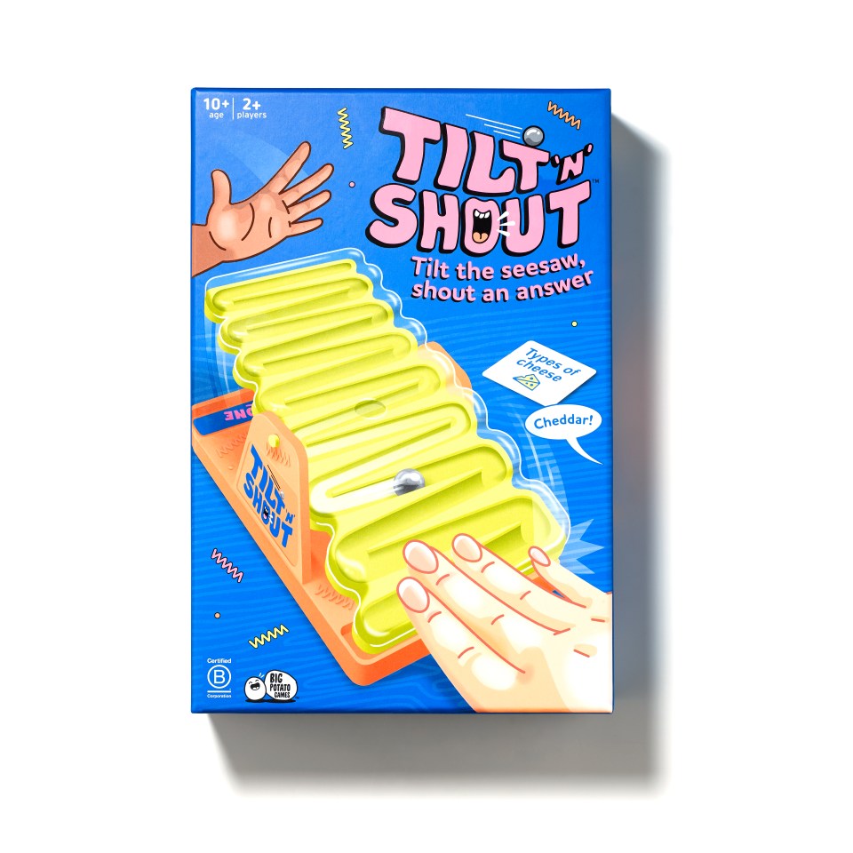 a box of tilt n shout that says tilt the seesaw shout an answer