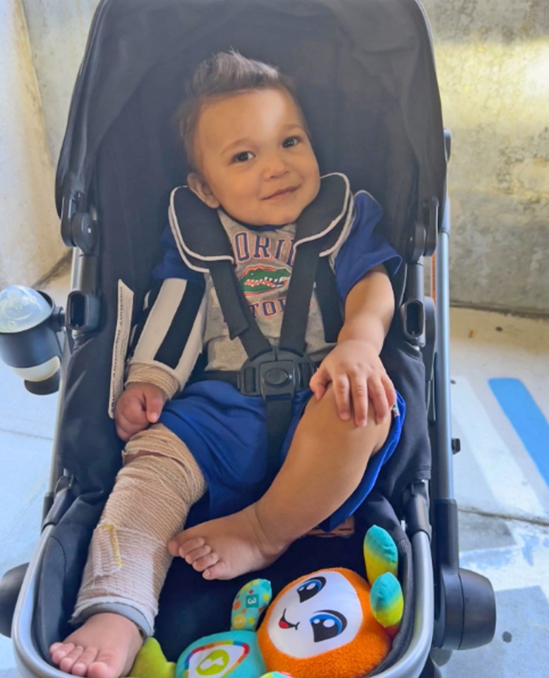 Giancarlo as he recovered, smiling in his pushchair