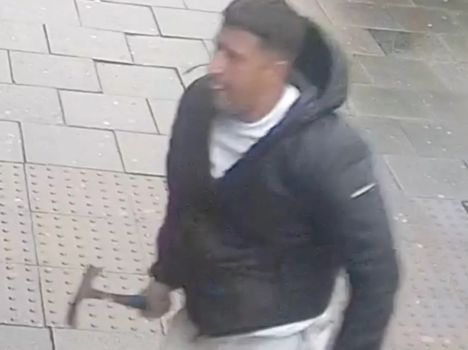 CCTV shows Abdul Wahab walk towards the shop in Spark Hill with the hammer on display