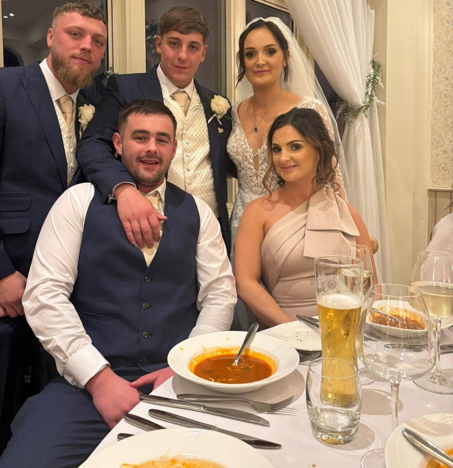 Wedding guests seated at a table.