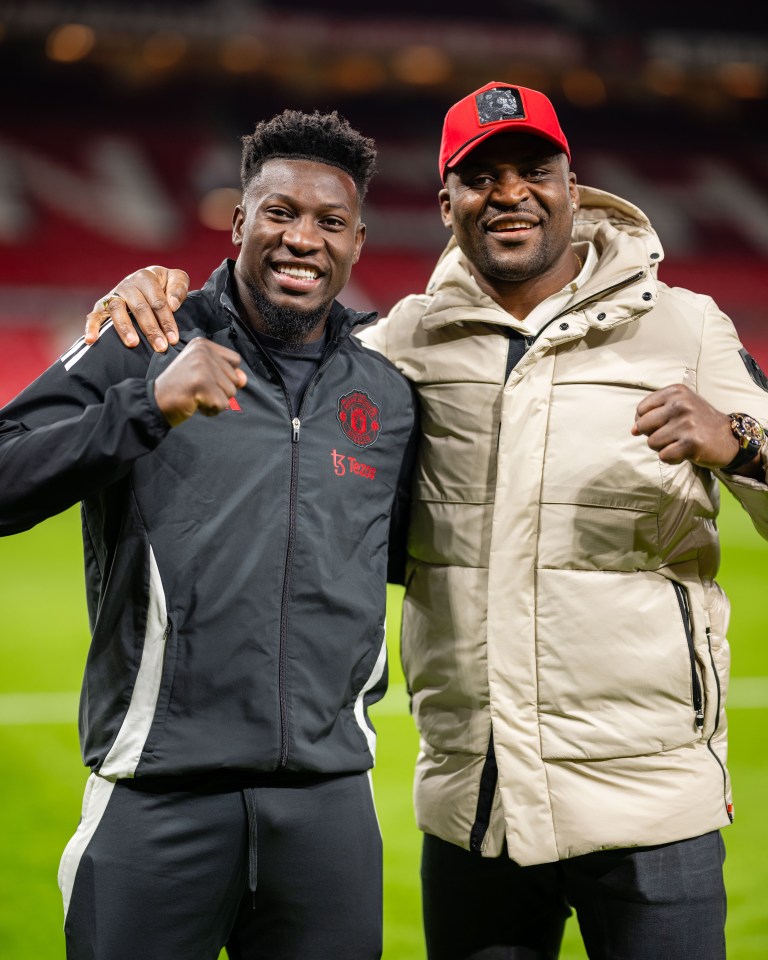 Onana beams as he poses with Francis Ngannou