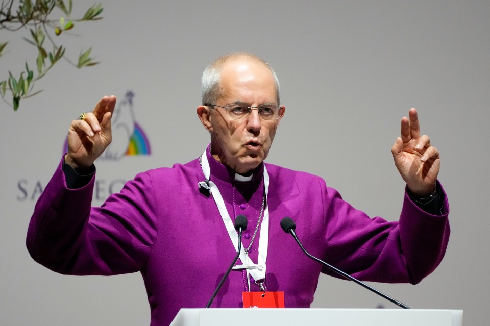 Mr Welby delivers his speech at a interreligious meeting in Rome in 2021