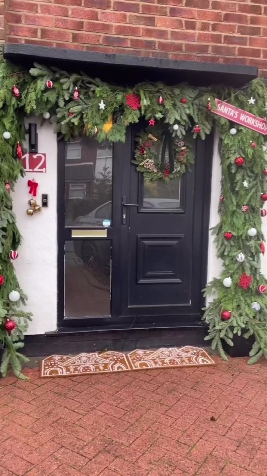 Social media users described her door display as 'brilliant' and even called it a 'masterpiece'