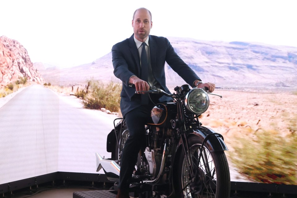 a man in a suit and tie is riding a motorcycle