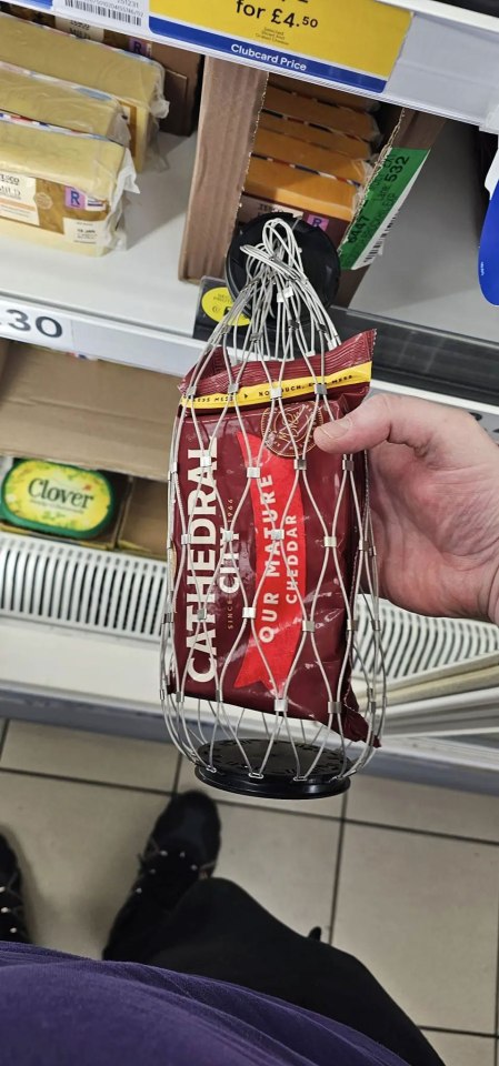 The cheese in its security netting