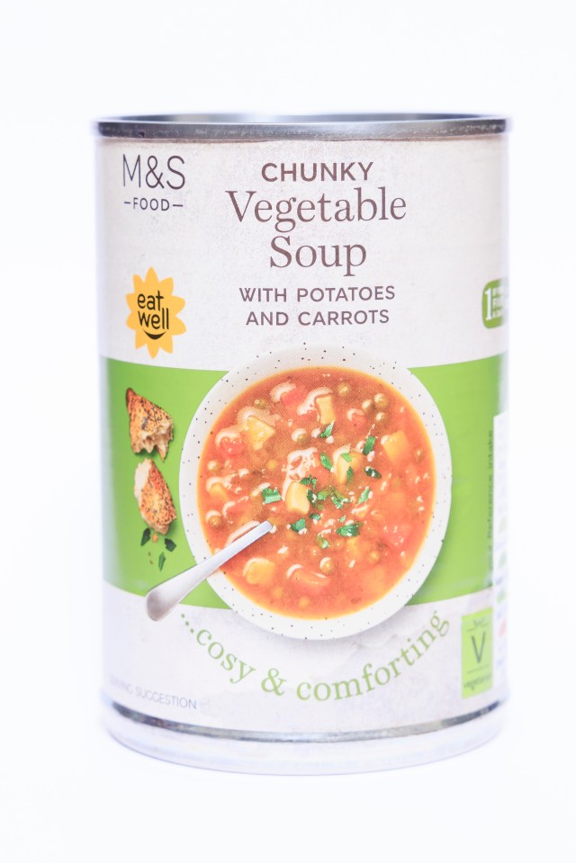 a can of chunky vegetable soup with potatoes and carrots