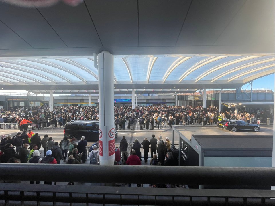 Passengers queuing up outside