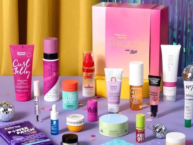 a variety of beauty products are displayed on a table