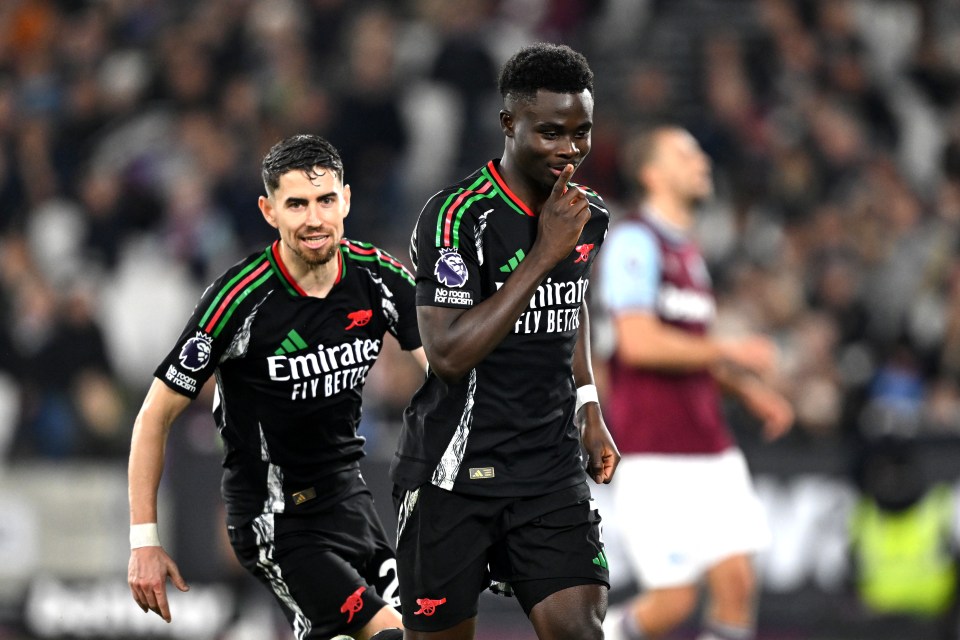 Bukayo Saka wheels away in celebration after scoring Arsenal's FIFTH of an action-packed first half