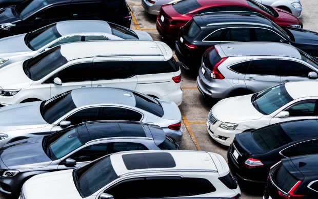 a lot of cars are parked in a parking lot