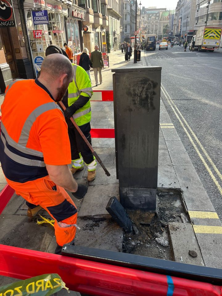 Workers repairing the street this morning following the collision