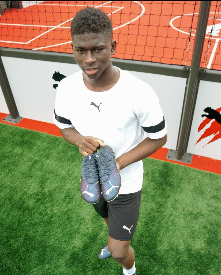 Baleba often wore football boots that were old, broken or too big when he was growing up