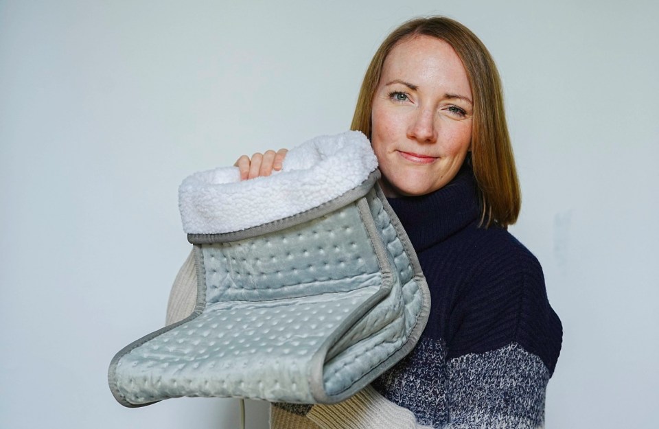 Chris Eades - 07980 775577.Sun consumer journalist Rosie Taylor tests out winter warmer xmas gifts.HEATED FOOTWARMER