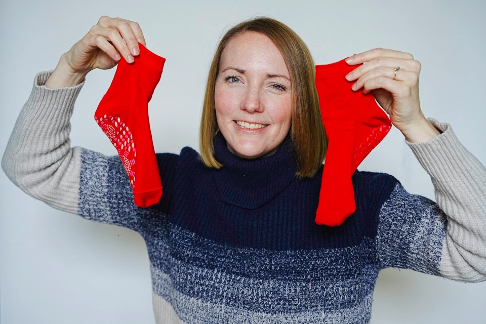 Chris Eades - 07980 775577.Sun consumer journalist Rosie Taylor tests out winter warmer xmas gifts.SOCKS