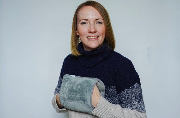 Chris Eades - 07980 775577.Sun consumer journalist Rosie Taylor tests out winter warmer xmas gifts.HOT WATERBOTTLE AND HANDWARMER