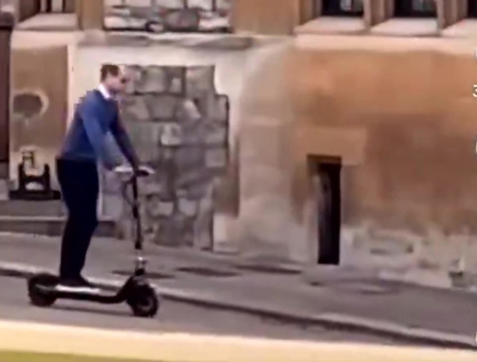 Prince William makes his way round Windsor estate with an e-scooter