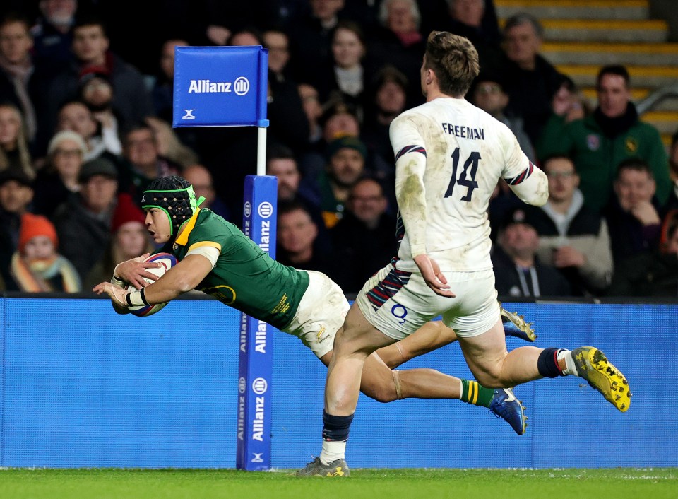 a rugby player with the number 14 on his back