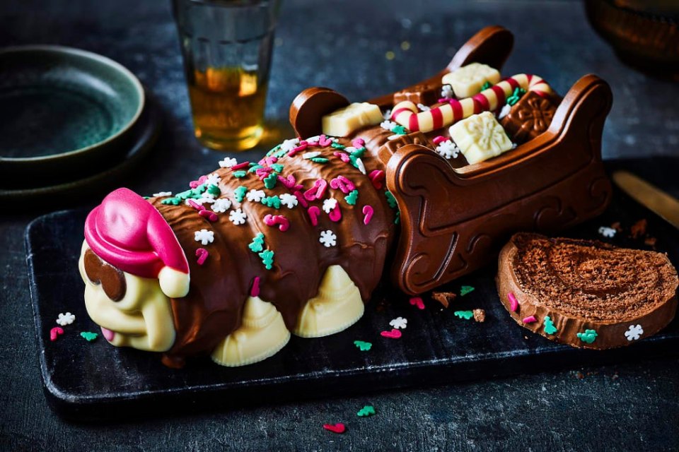 The new M&S Colin the Caterpillar for Christmas in a chocolate sleigh