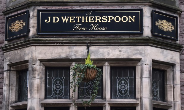 a sign for the jd wetherspoon free house