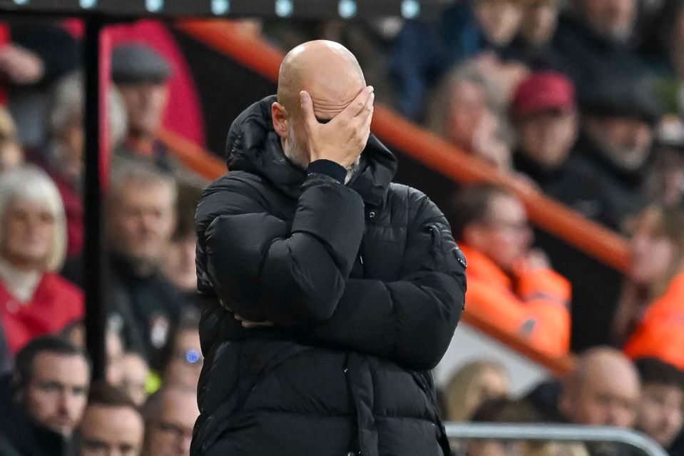 a man in a black jacket stands in front of a soccer team