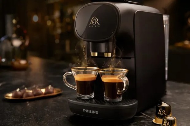 a philips coffee machine is making two cups of coffee