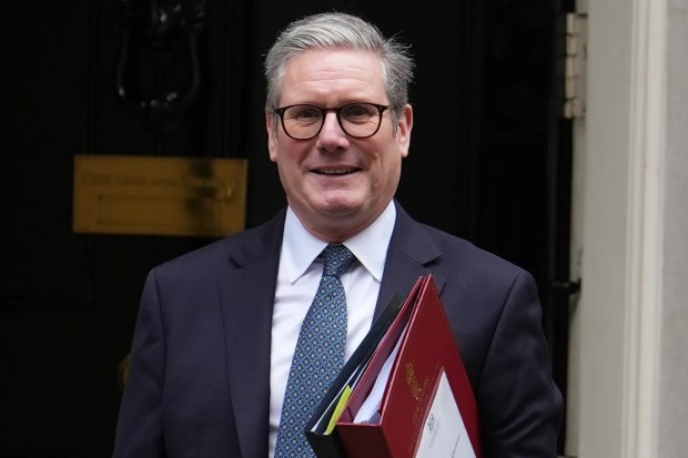 a man in a suit and tie holds a red folder that says ' secretary of state ' on it