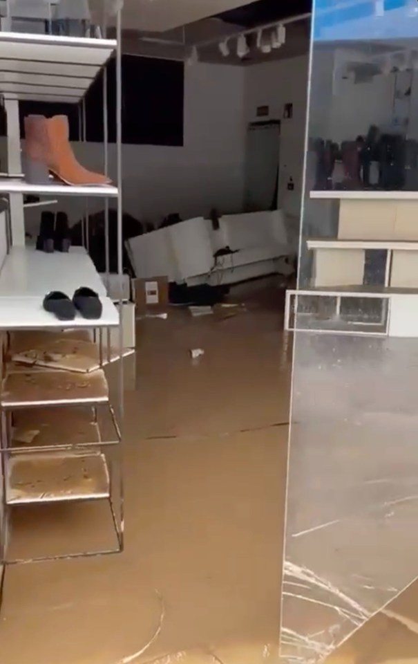 a picture of a flooded store with spx written on the bottom