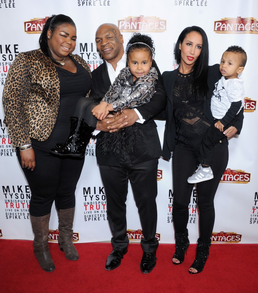 Tyson with his daughters Mikey, far left, Milan middle, his wife and son Morocco, far right