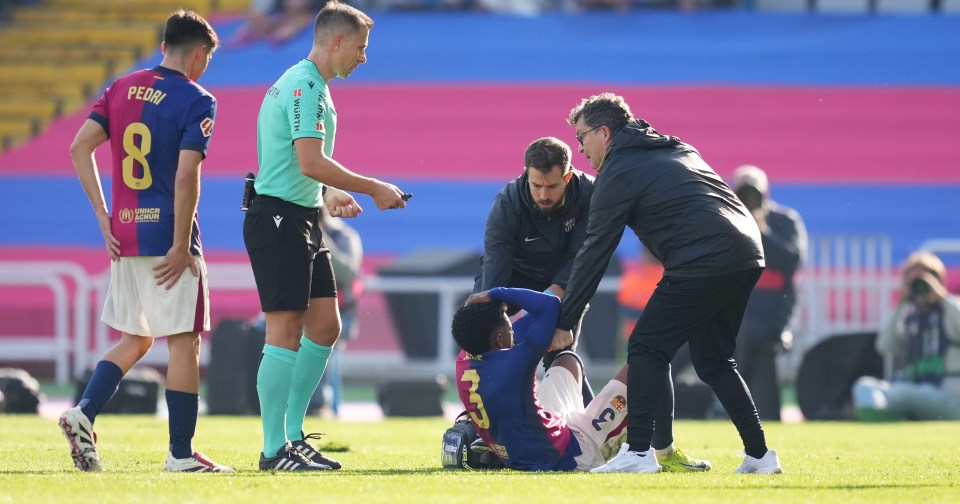 Barcelona defender Alejandro Balde went down following a collision