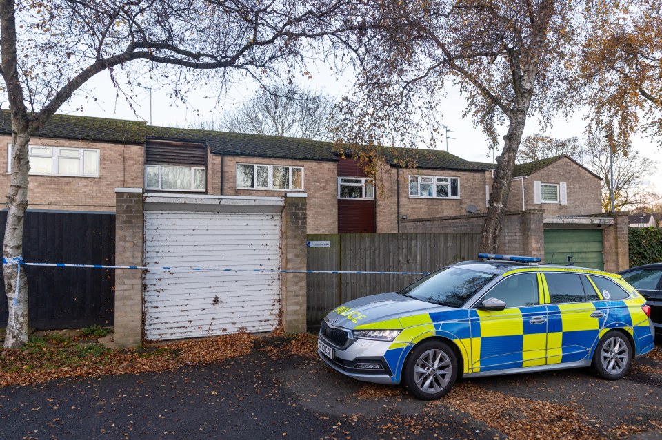 Police guarding the scene on Sturton Walk, Corby, this morning