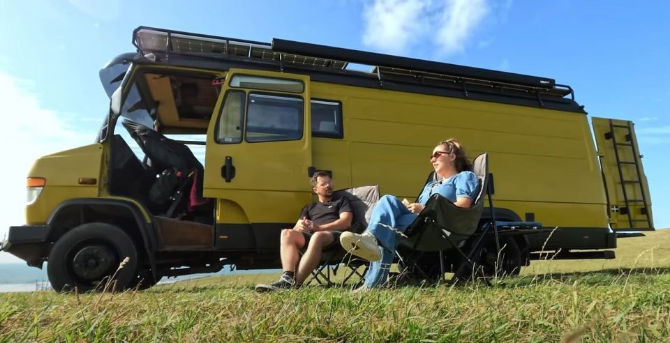 Tash and Connor live in a large yellow van that lets them work and travel