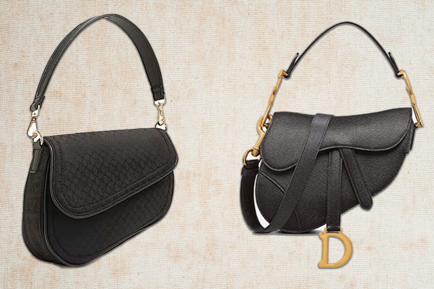 a black purse with the letter d on it