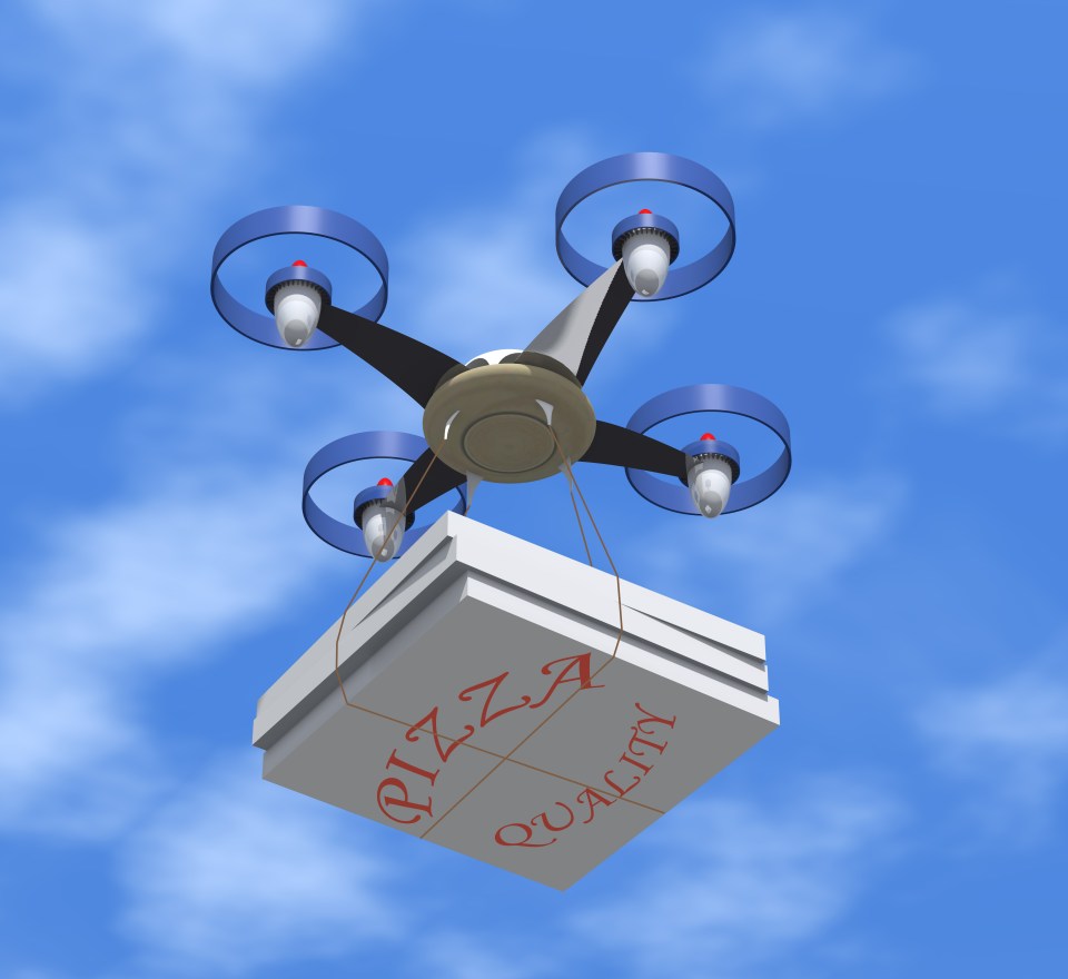 a drone is carrying a pizza box that says pizza quality