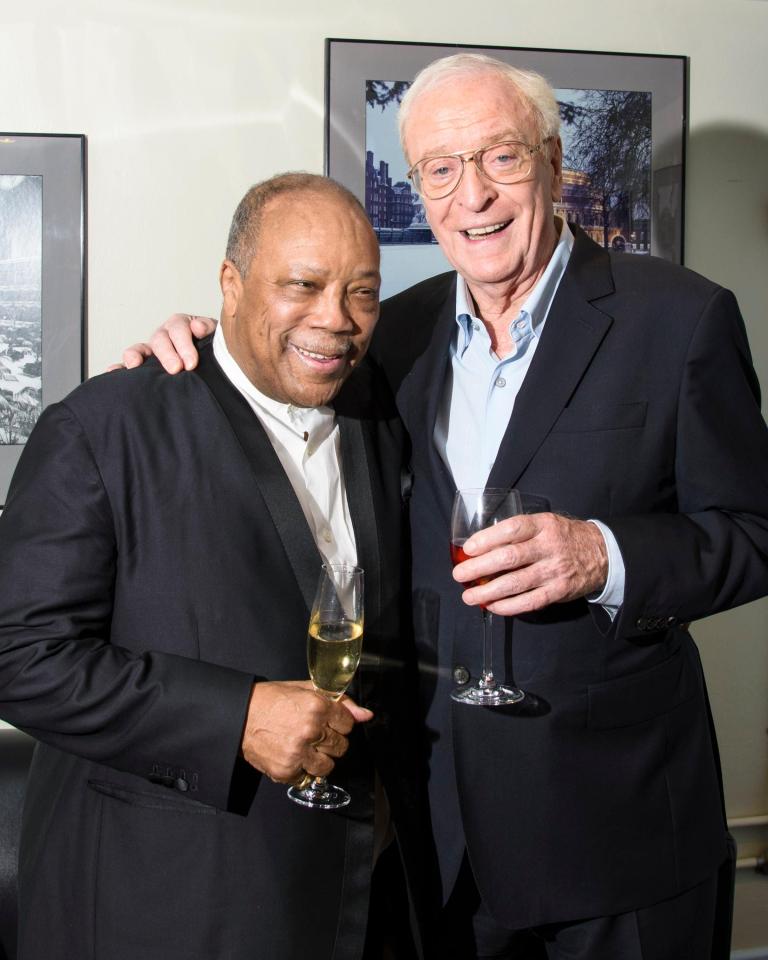 Quincy with Michael Caine, who he shared a birthday with