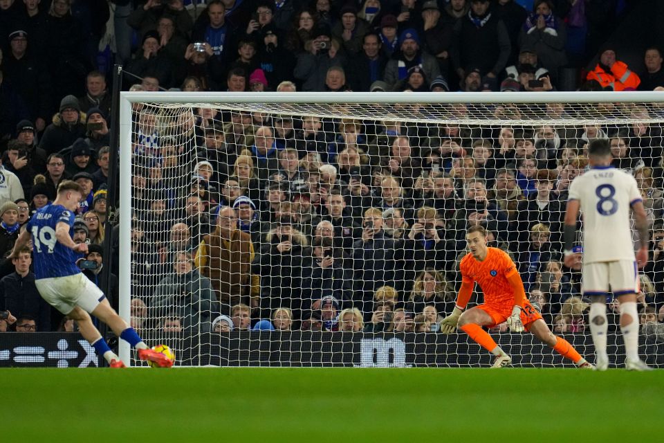 Liam Delap of Ipswich Town scores a penalty kick against Chelsea.