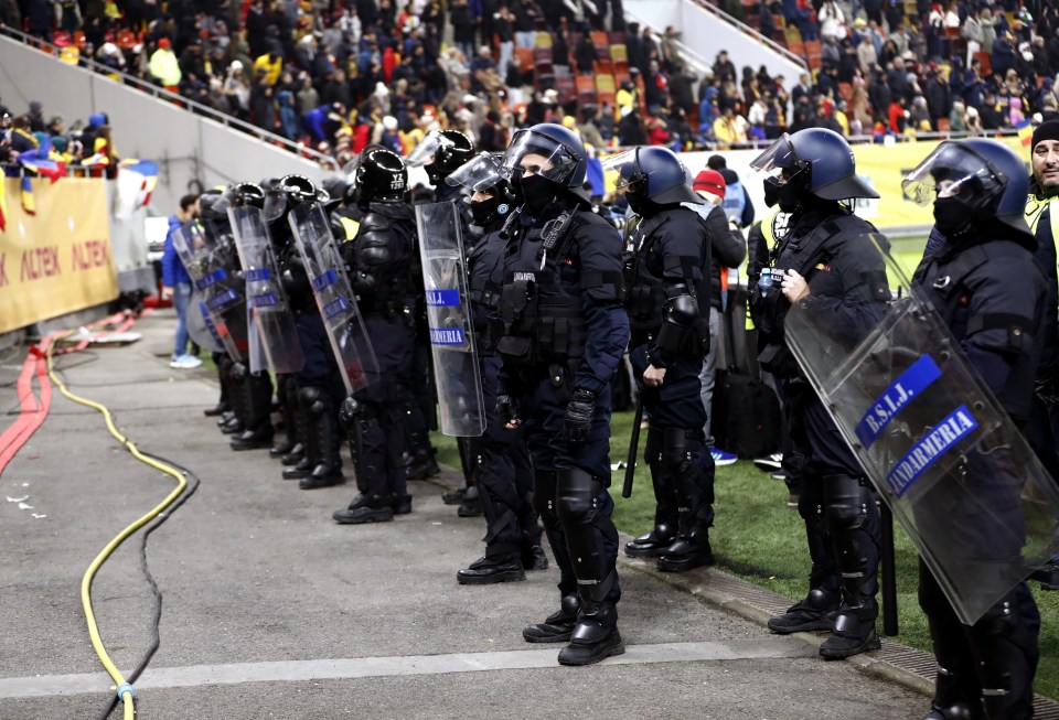 Riot police moved in front of the stands in a chaotic finish to the night