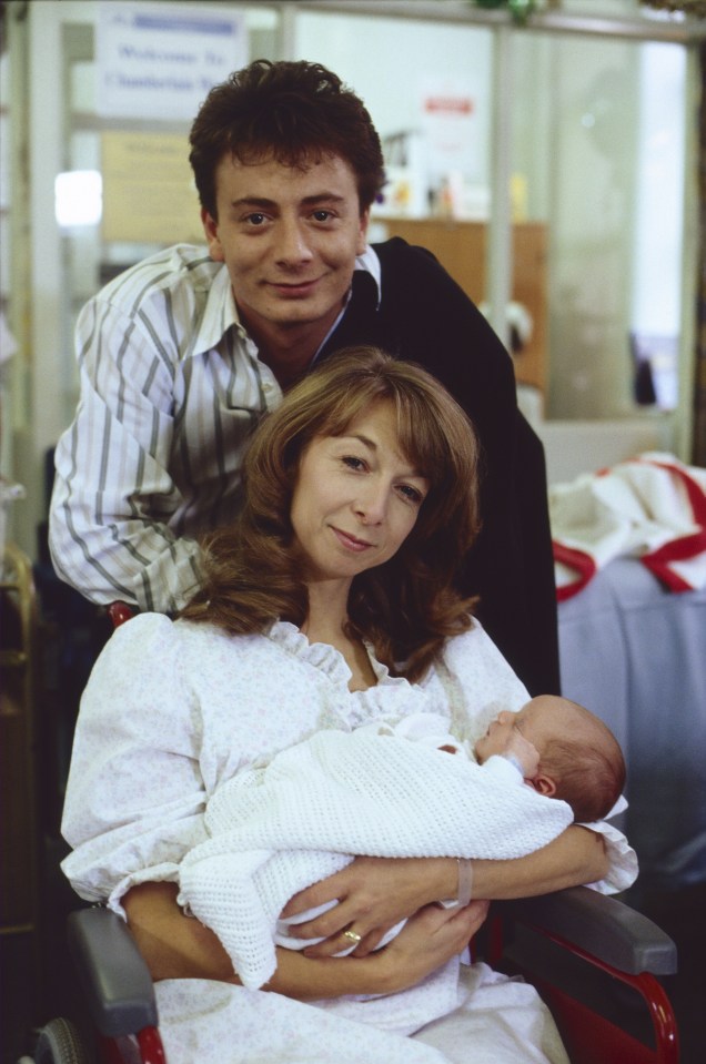 Sean with co-star Helen Worth after the birth of their onscreen son David