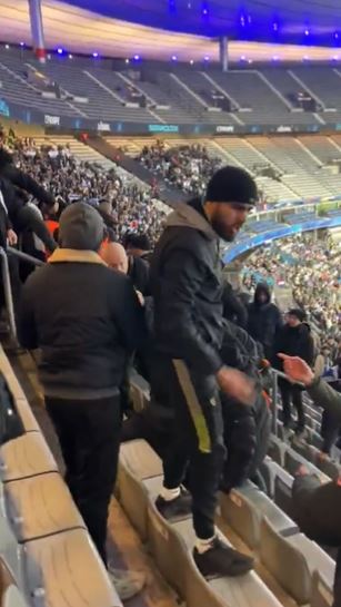 Fighting has erupted in the stands of the Stade de Paris as France faces Israel in a football match