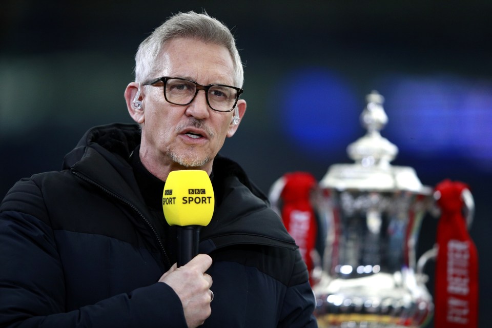 a man holding a microphone that says bbc sport