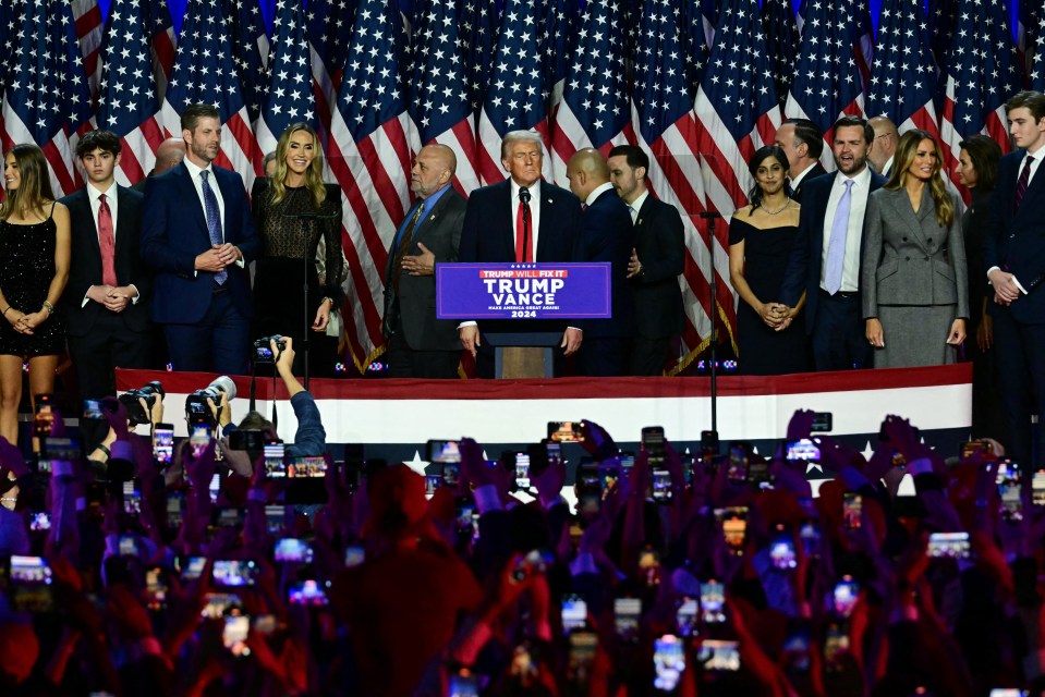 Trump and his entourage on stage in Florida