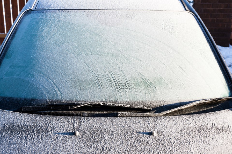 a car that has been covered in snow and ice