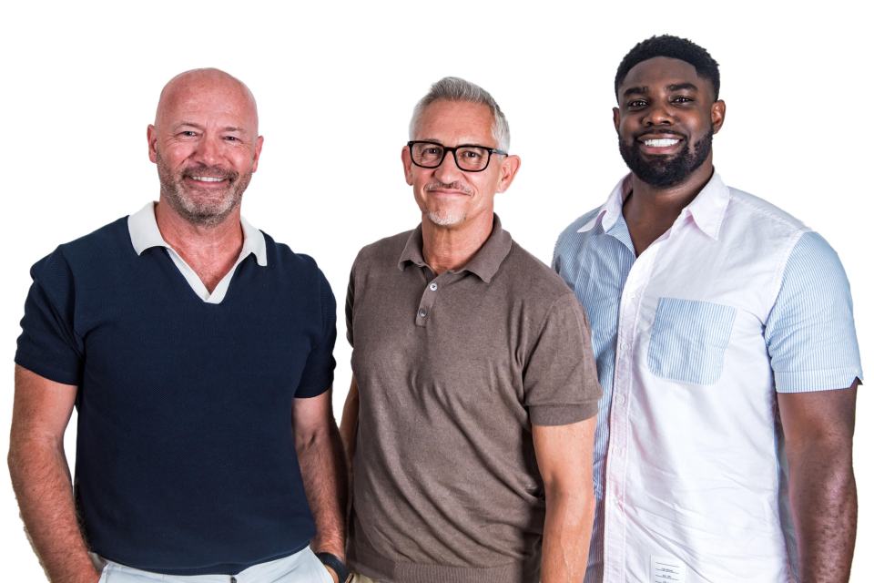 three men standing next to each other with one wearing a shirt that says thom browne