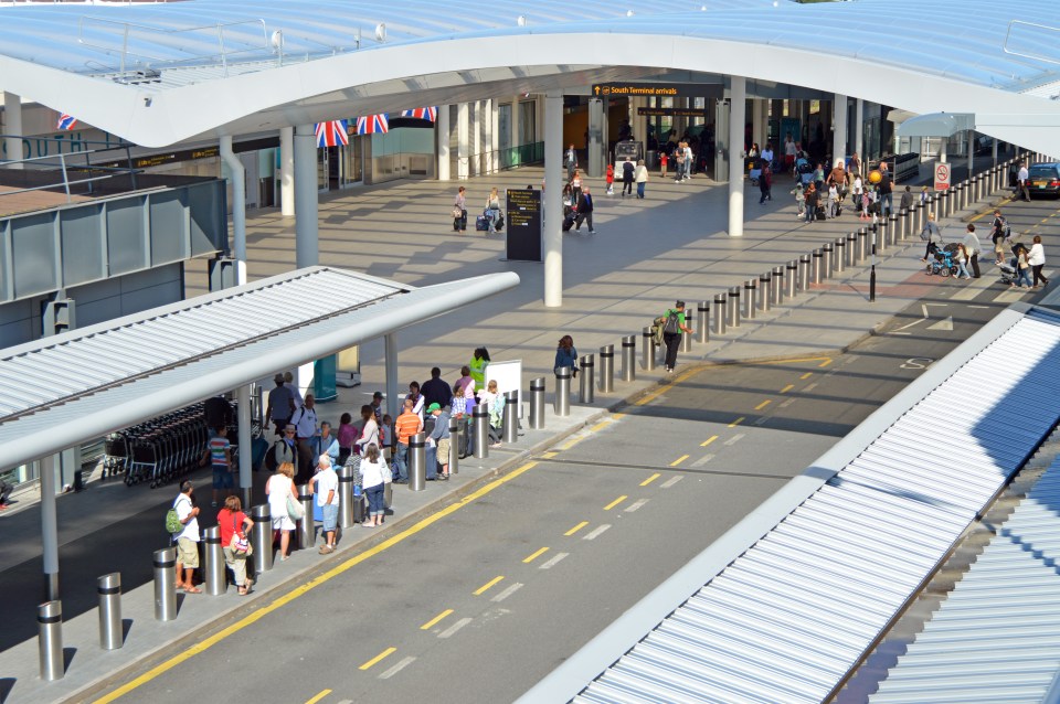 People waiting for courtesy buses to long-term car parks