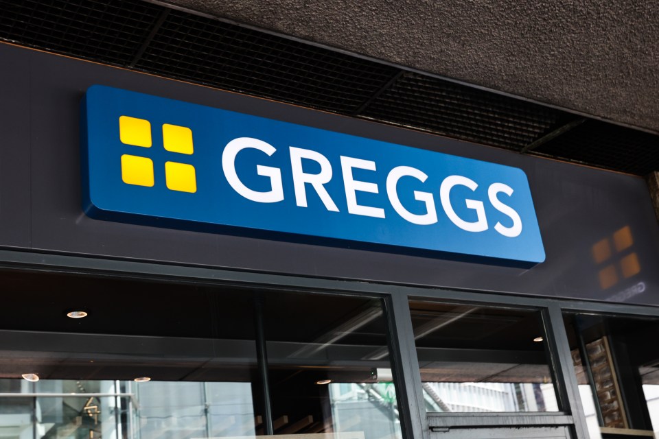 a blue sign that says greggs on it