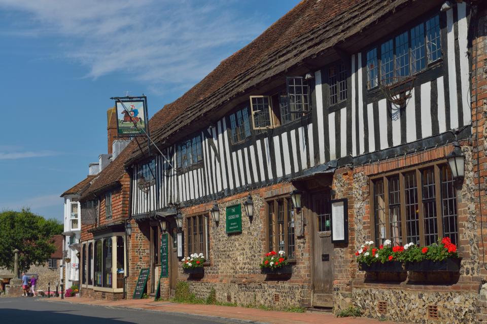 Alfriston is a picture-perfect chocolate box village, with quaint shops lining its high street