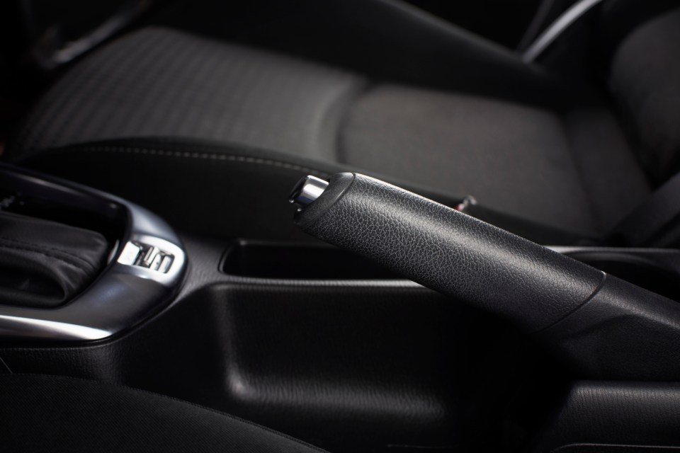 a close up of a hand brake in a car