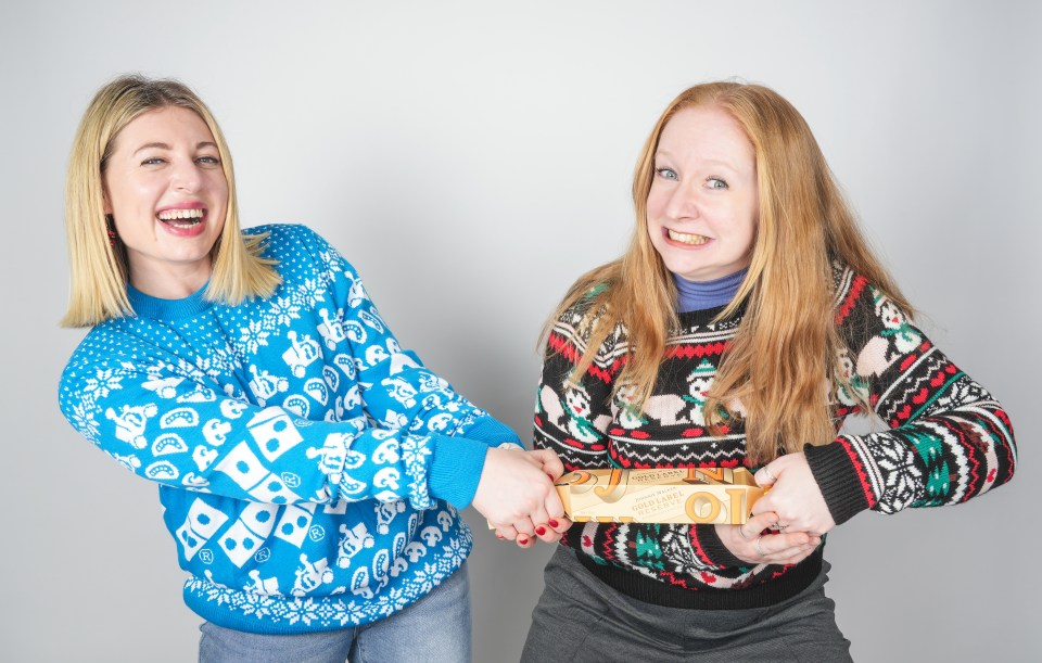 Hayley Minn and Thea Jacobs trying out boozy Christmas crackers