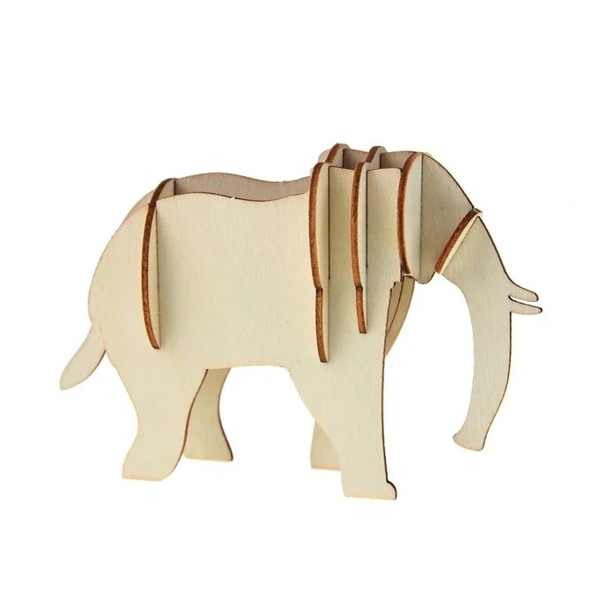 a small wooden elephant with a long trunk