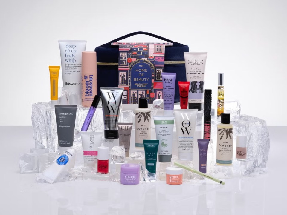 a variety of beauty products are displayed in front of a bag that says home of beauty